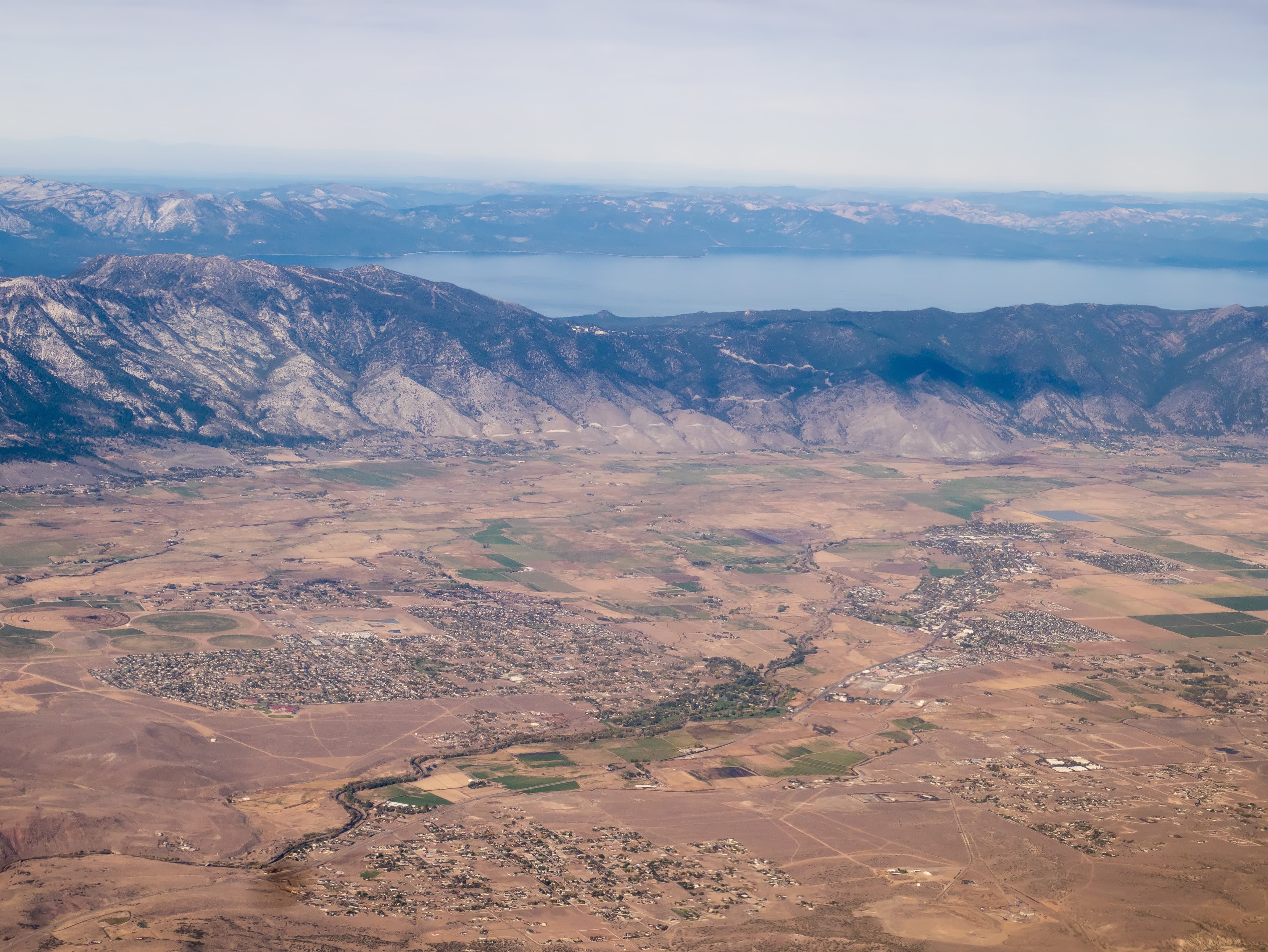Aerial view of Carson City with Lake Tahoe in background